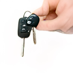 dłoń trzymająca kluczyki do samochodu